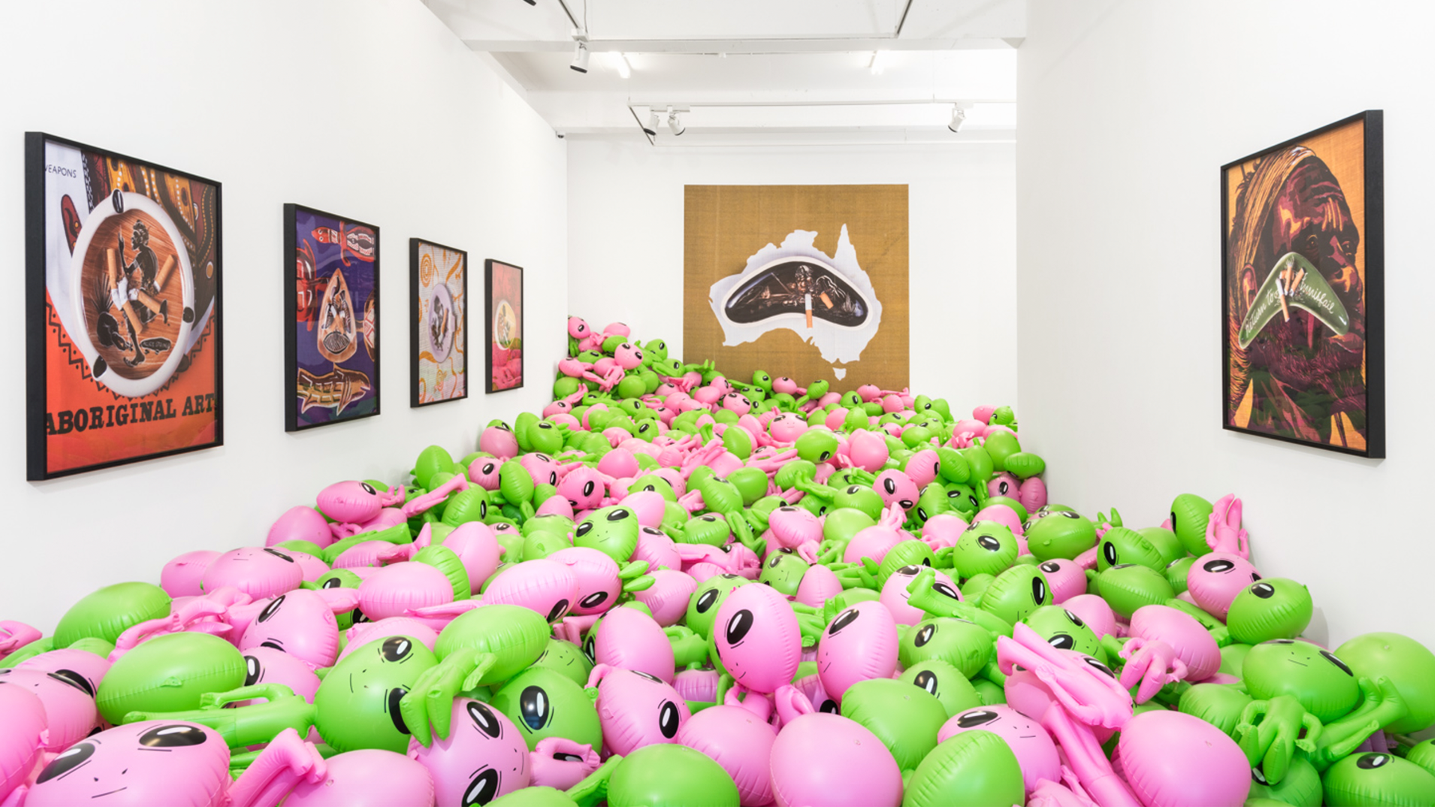 Blow up aliens fill a gallery room 